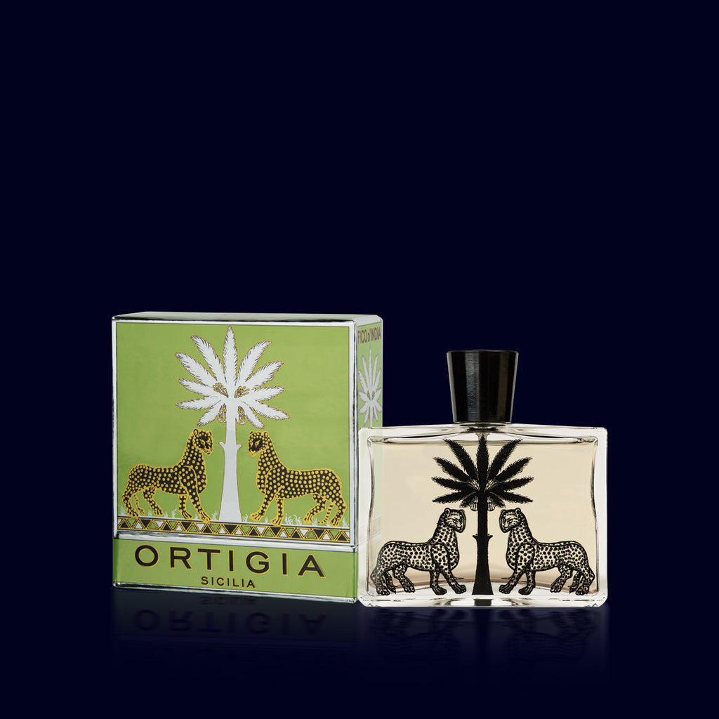 ortigia signature scent in a glass bottle printed with black leopard and its green, gold and black luxurious box. fico d'india