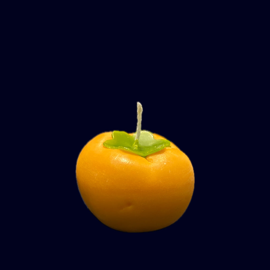 Persimmon shaped candle