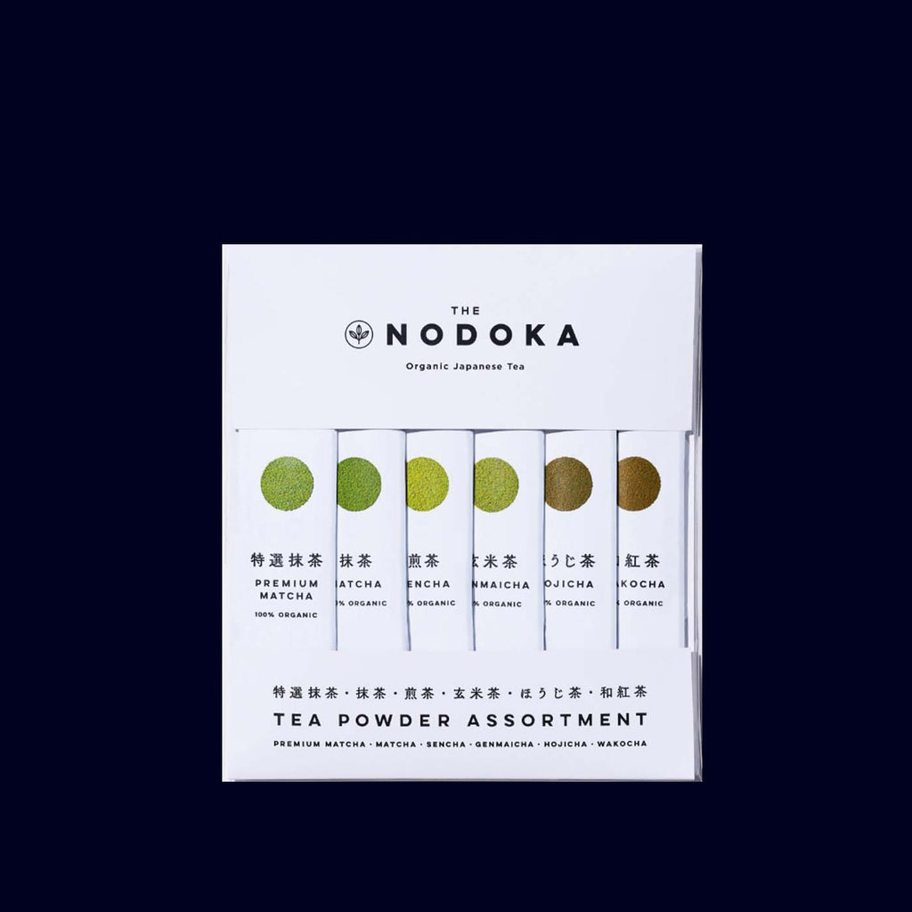 Nodoka tea powder assortment packaging on a black background