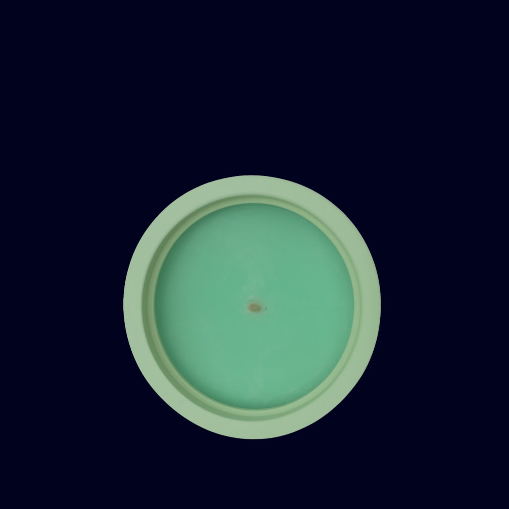 moroccan candle aether in green vessel
