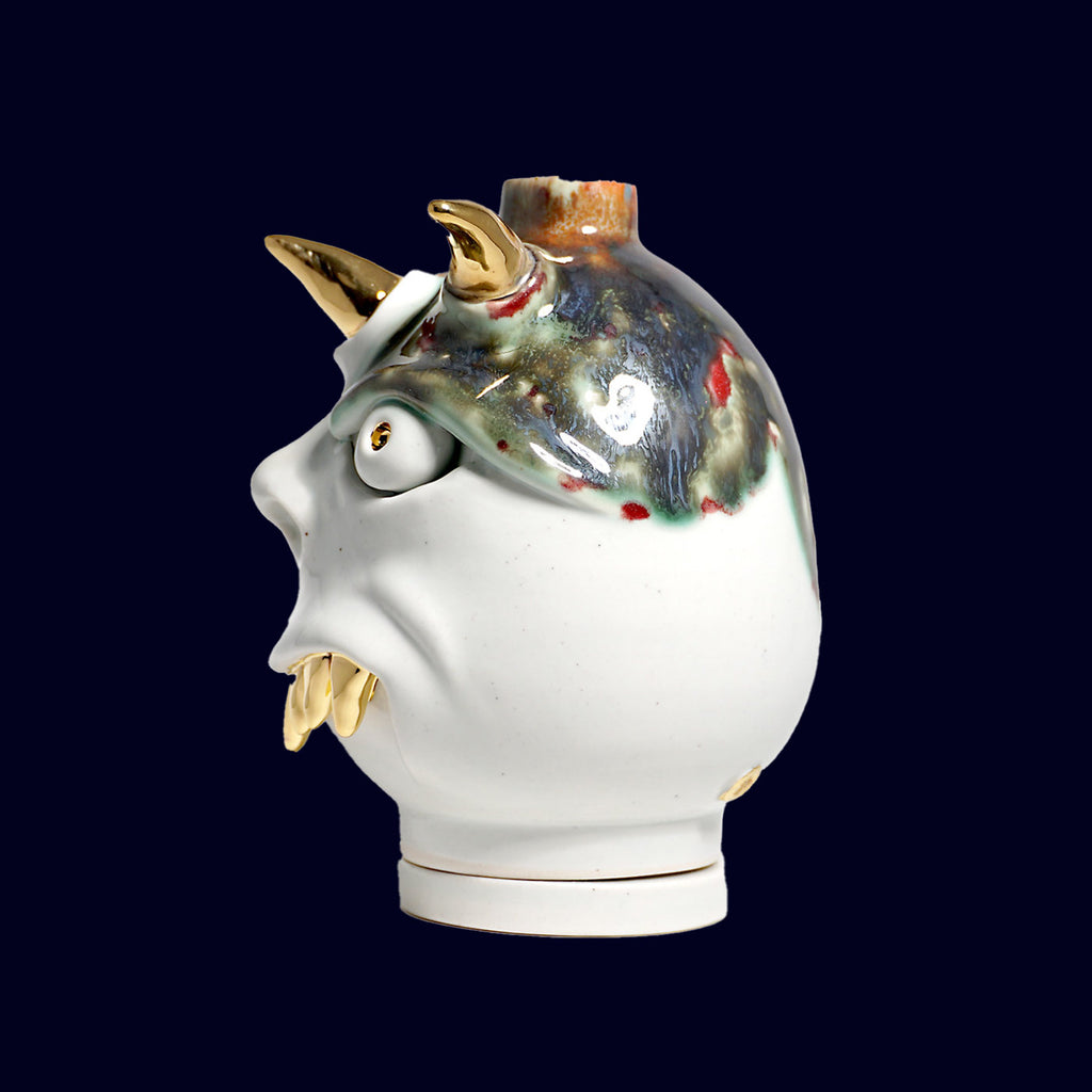 dogabi incence burner  ceramic monster gold teeth