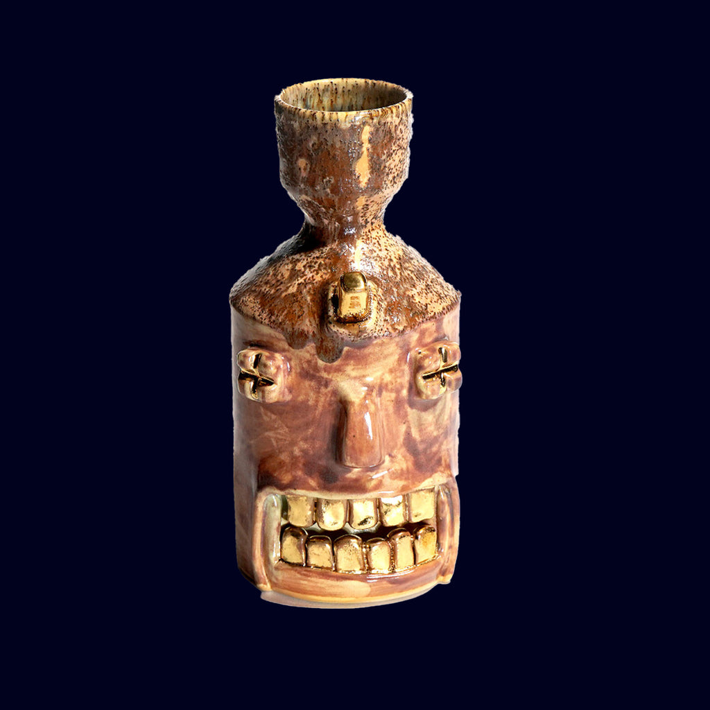 decanter ceramic monster gold teeth dogabi