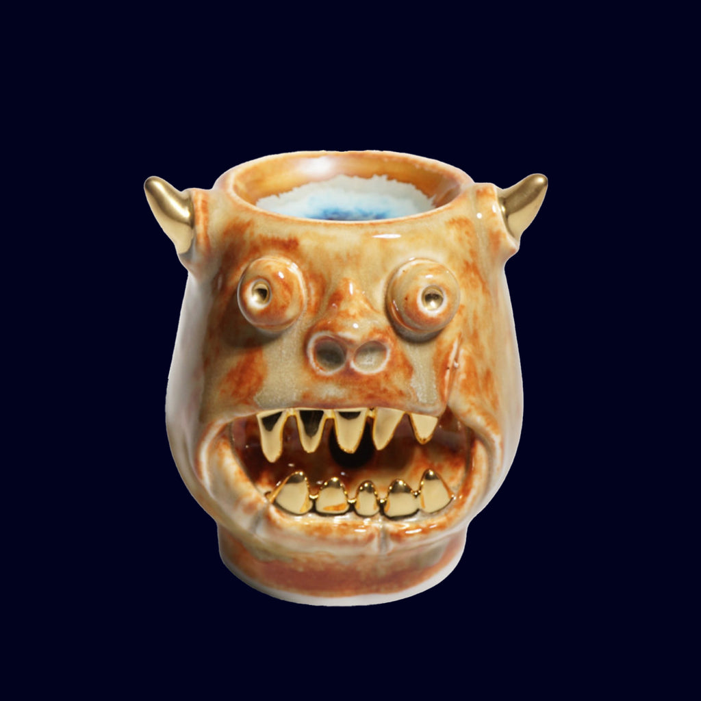 dogabi ceramic mon ster gold teeth oil lamp