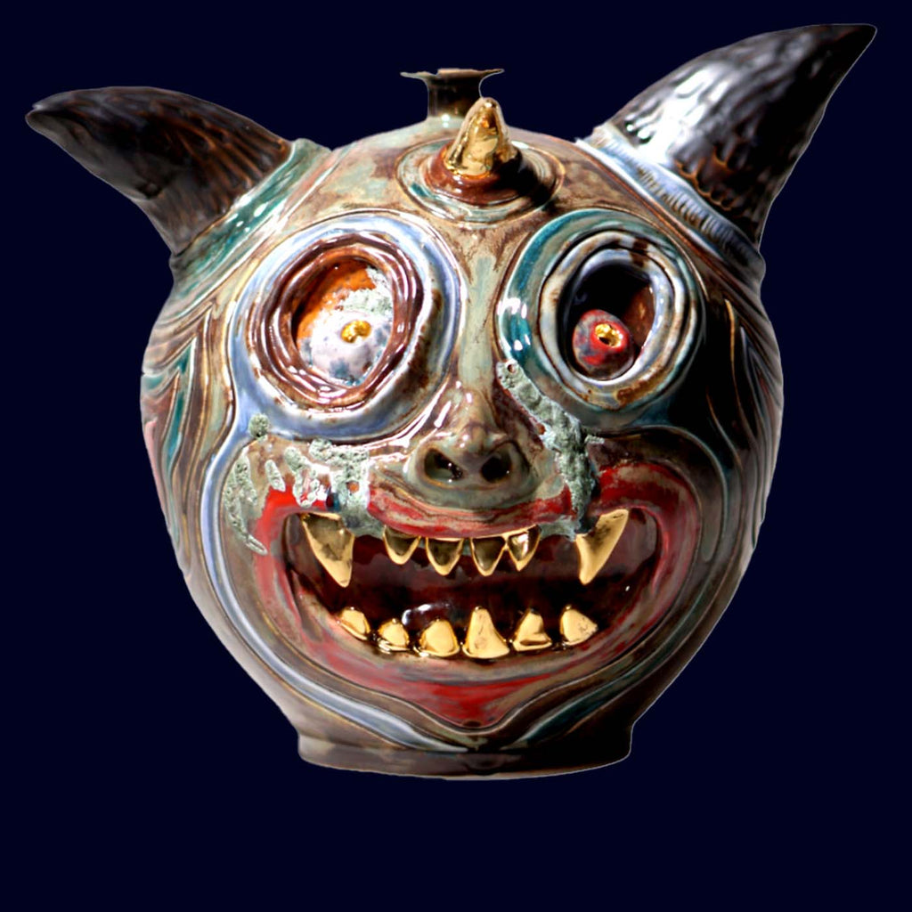 dogabi ceramic jar with gold teeth
