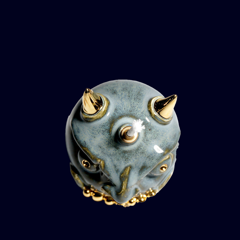 dogabi oil lamp ceramic monster gold teeth