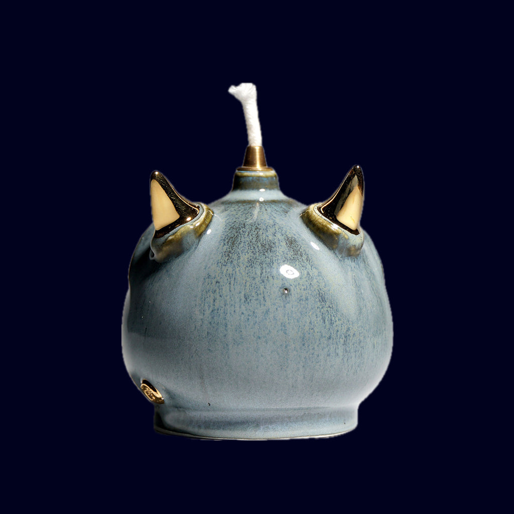 dogabi oil lamp ceramic monster gold teeth