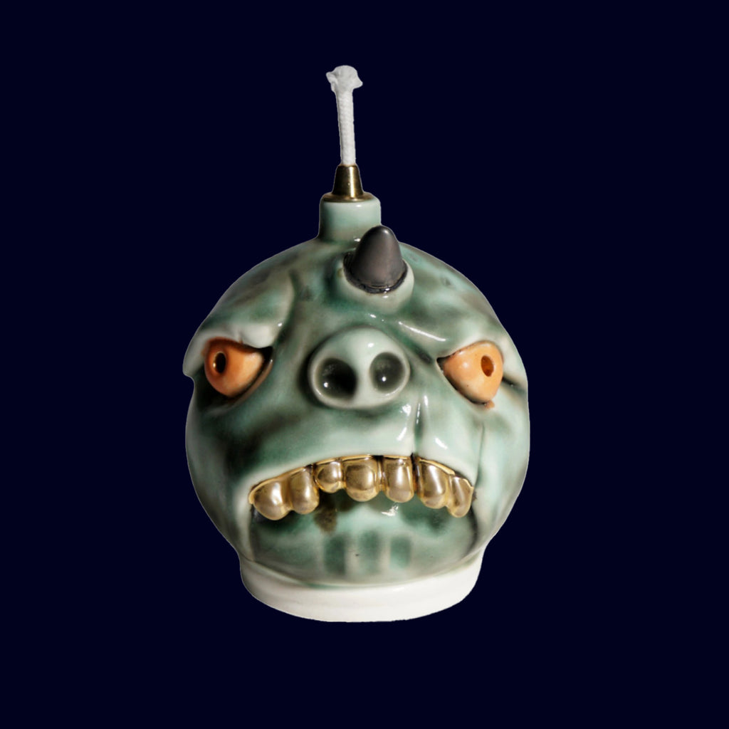ceramic dogabi oil lamp with gold teeth