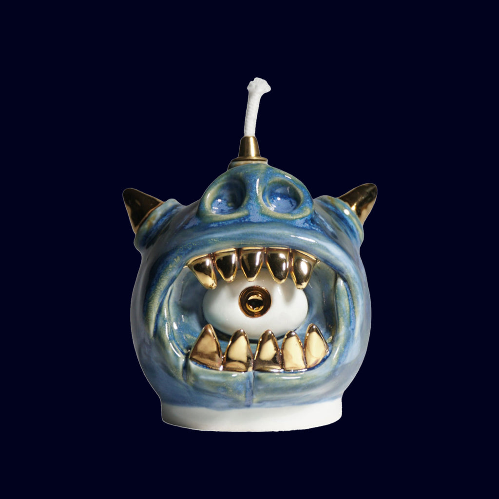 dogabi ceramic oil lamp monster with gold teeth