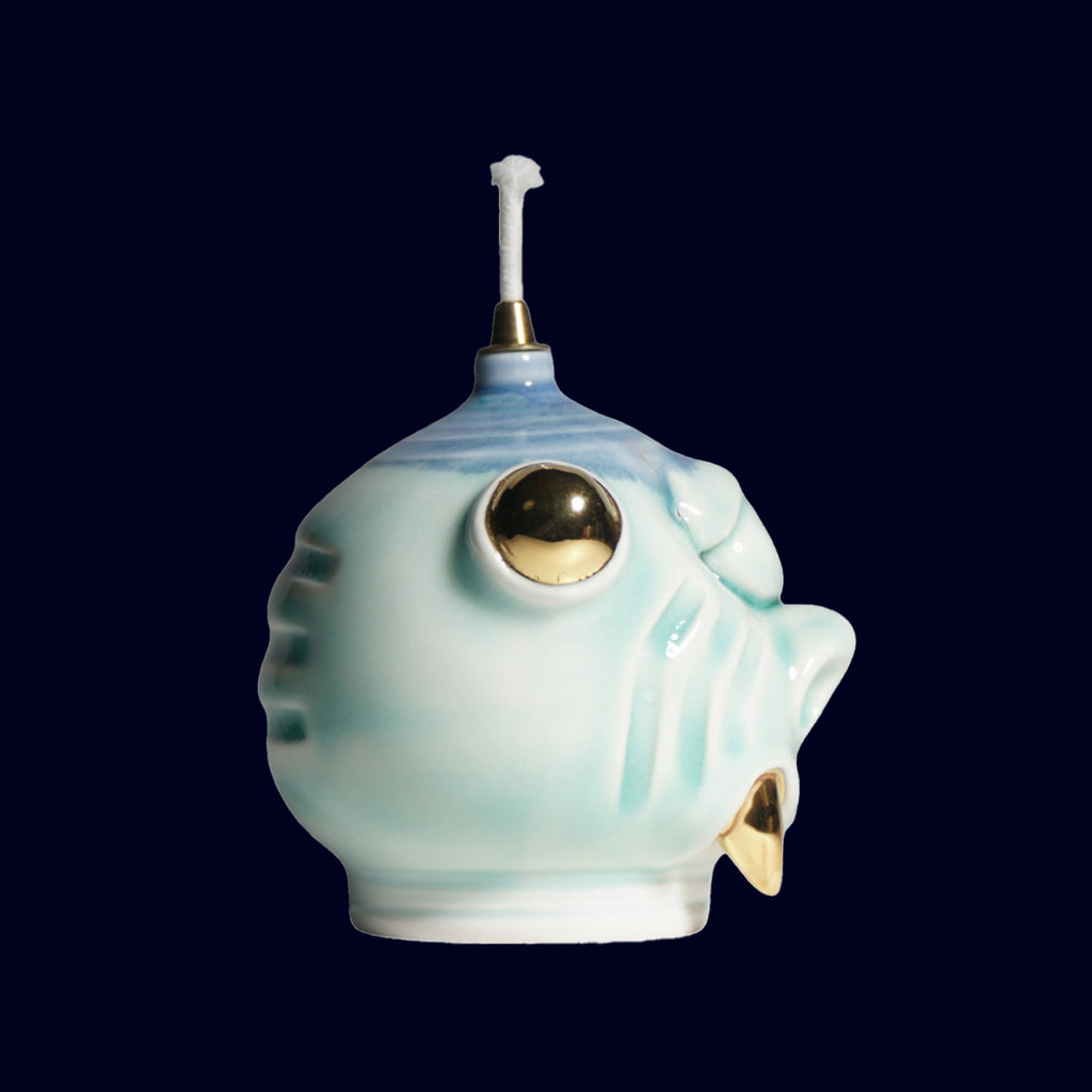 dogabi ceramic oil lamp monster with gold teeth