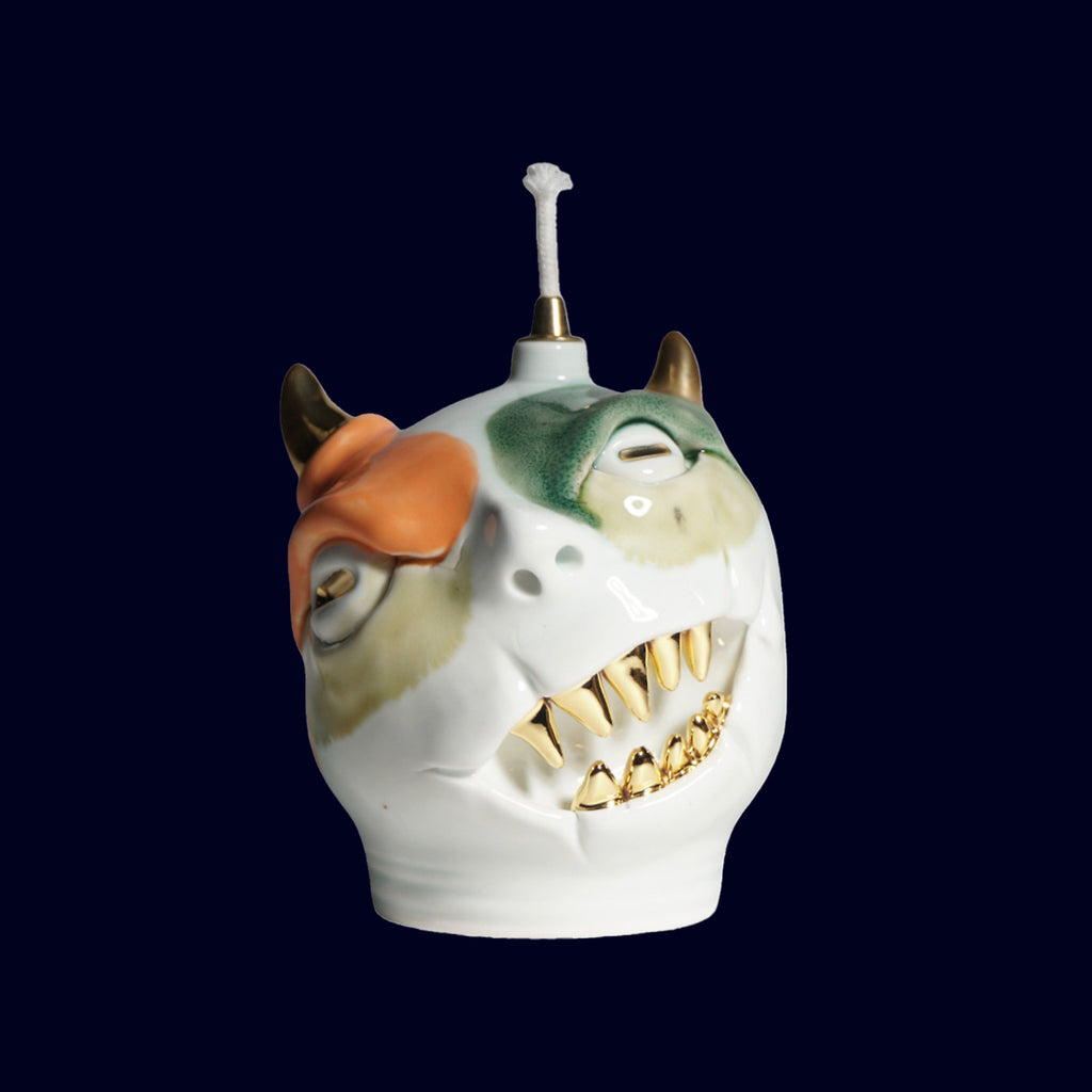 dogabi ceramic oil lamp monster with gold teeth