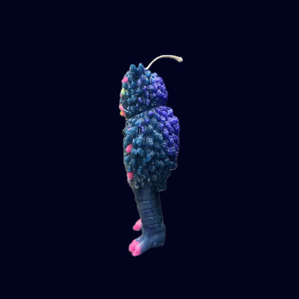 candle shapped as a japanese anime kaiju