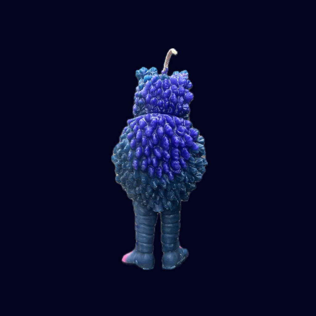 candle shapped as a japanese anime kaiju