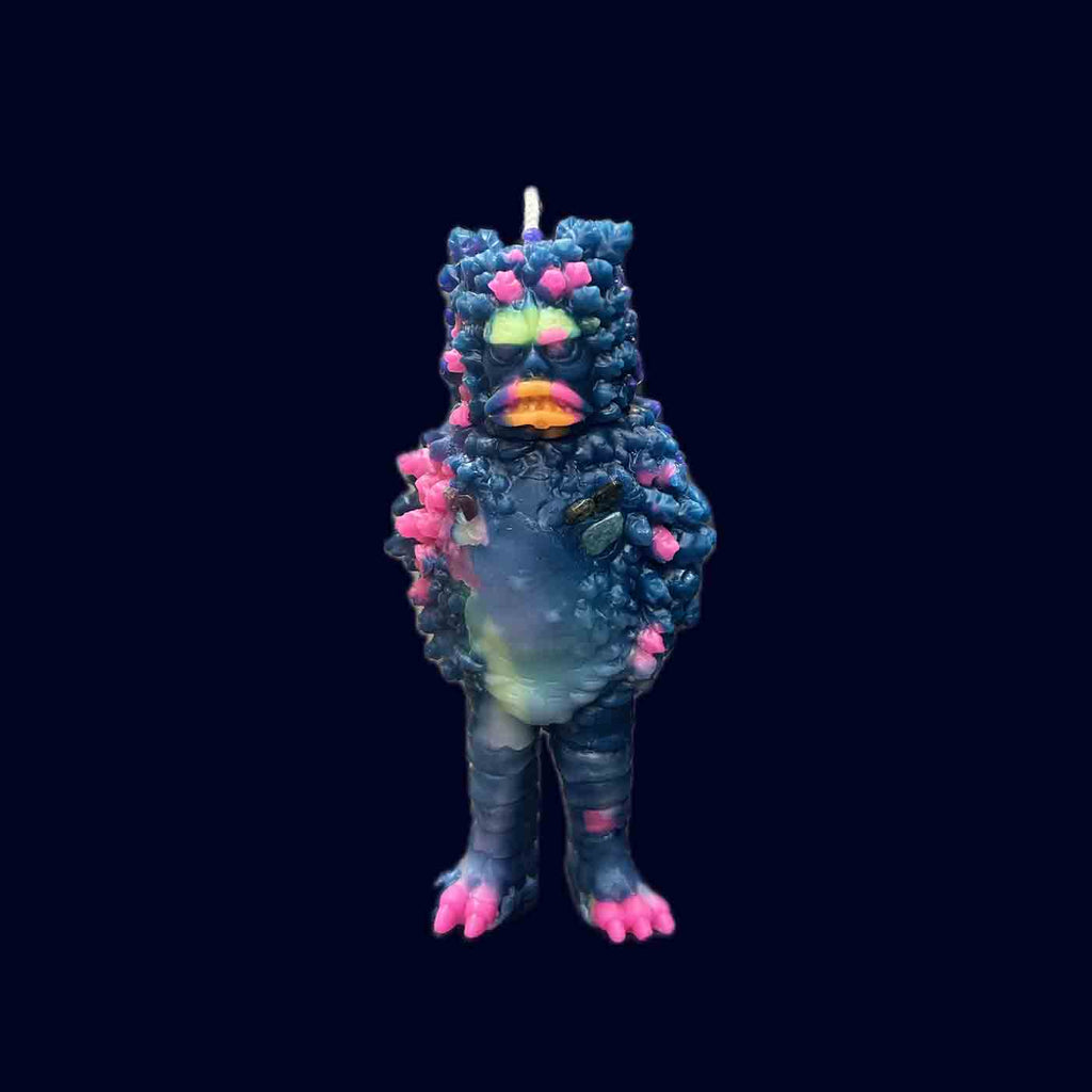 candle shapped as a japanese anime kaiju