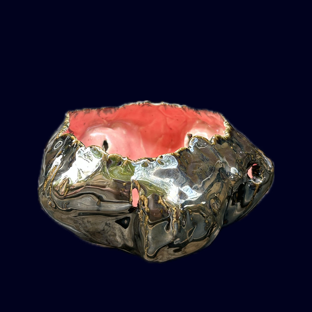 silver and pink ceramic dish