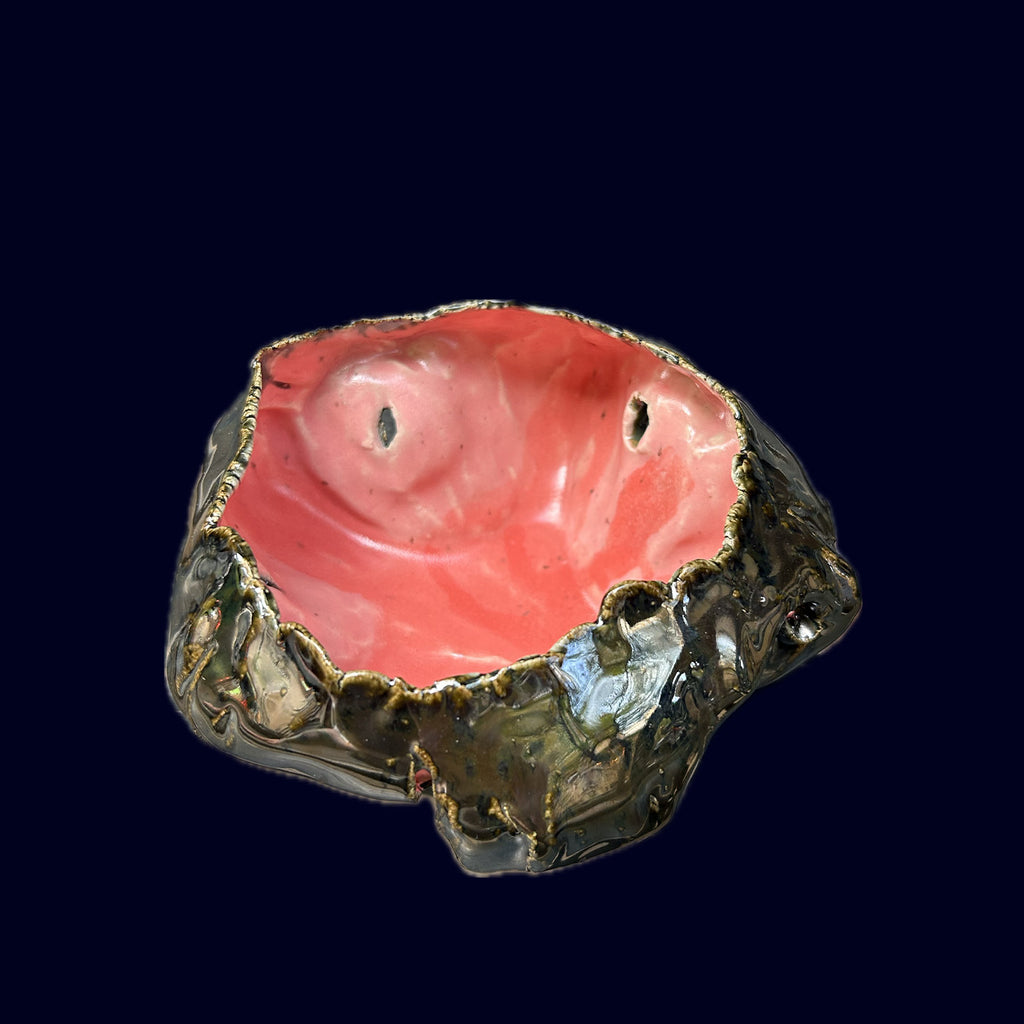 silver and pink ceramic dish