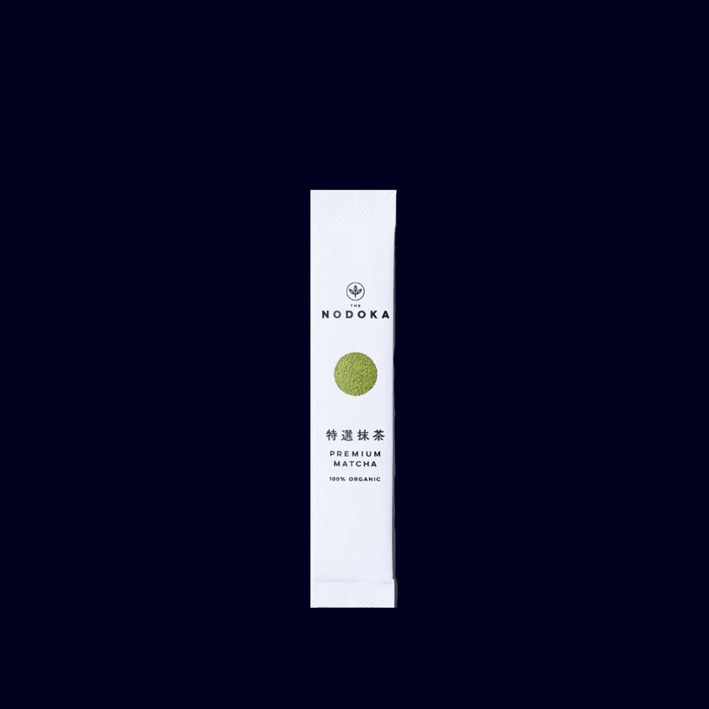 Nodoka matcha tea stick on a black background