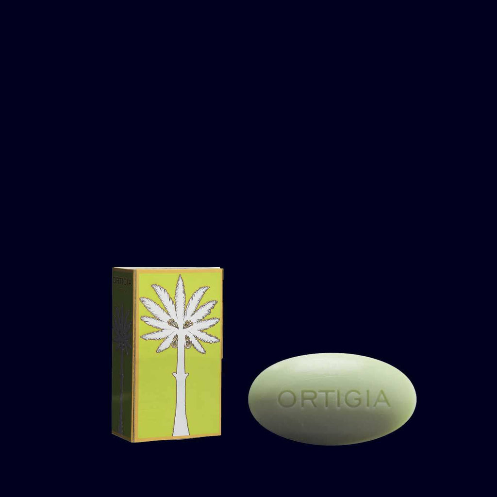 ortigia oval soap next to its metallic green, gold and silver gift box-bergamot